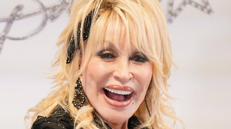 Dolly Parton’s Newest Album Features Duets with Dinosaurs Recorded at Dollywood