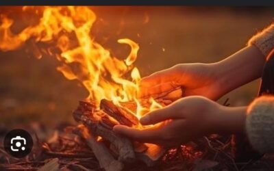 just in:: generative al depicts a person warming hand by fire due to…